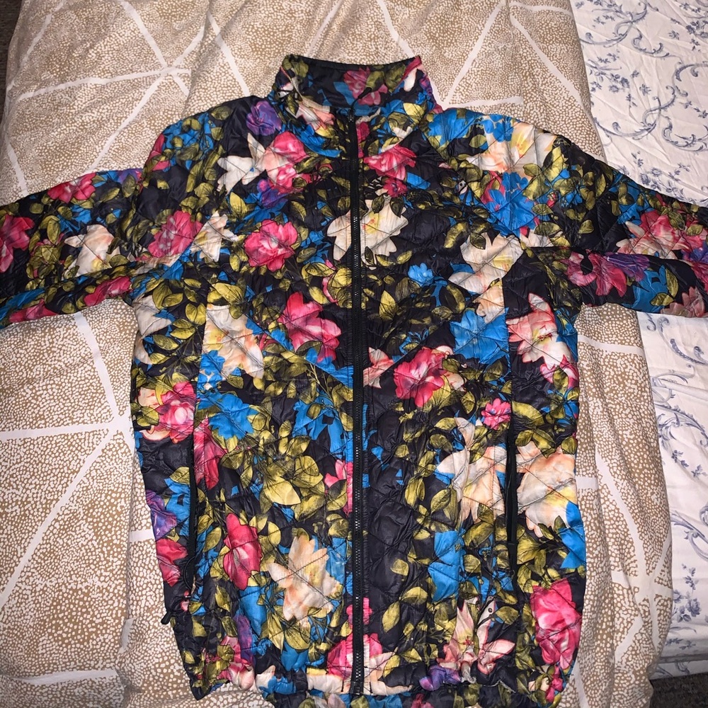 Gently worn Women floral North Face